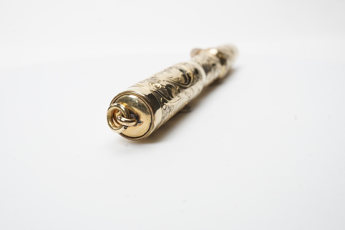 A Conklin ring top hand engraved crescent filler fountain pen with 14ct. gold Conklin flexible nib